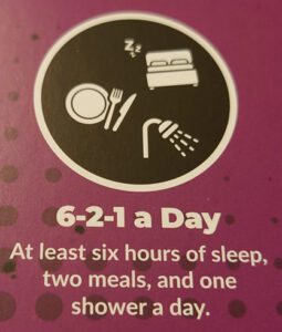 From Confuzzled 23's Code of Conduct: A circle that contains icons for a bed, a plate and utensils, and a shower Under the icon reads: 6-2-1 a Day At least six hours of sleep, two meals, and one shower a day.