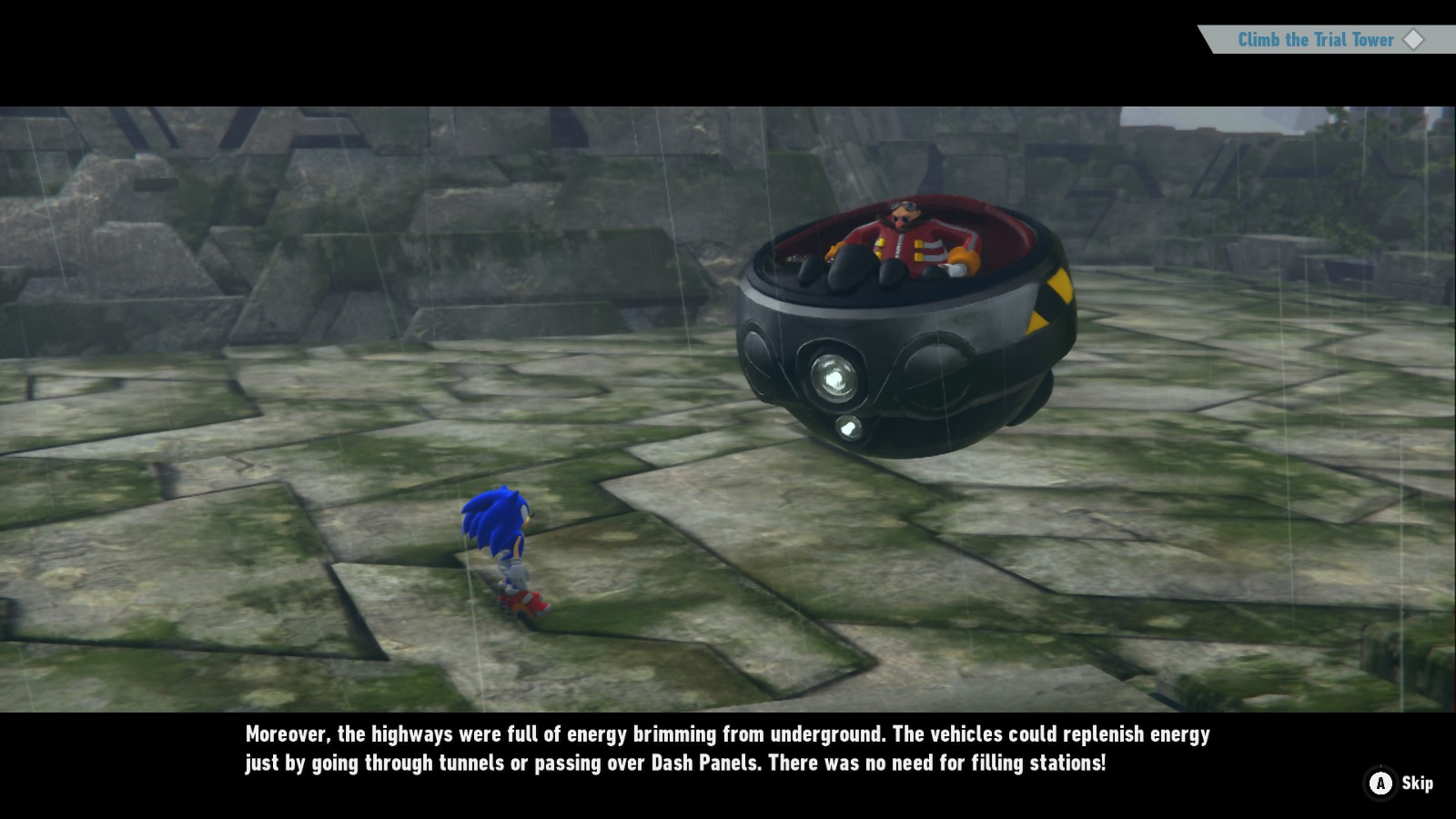 A screenshot of Sonic Frontiers. Eggman in his Eggmobile is talking to Sonic while in some ruins. The subtitle below reads: "Moreover, the highways were full of energy brimming from the underground. The vehicles could replenish energy just by going through tunnels or passing over Dash Panels. There was no need for filling stations!"