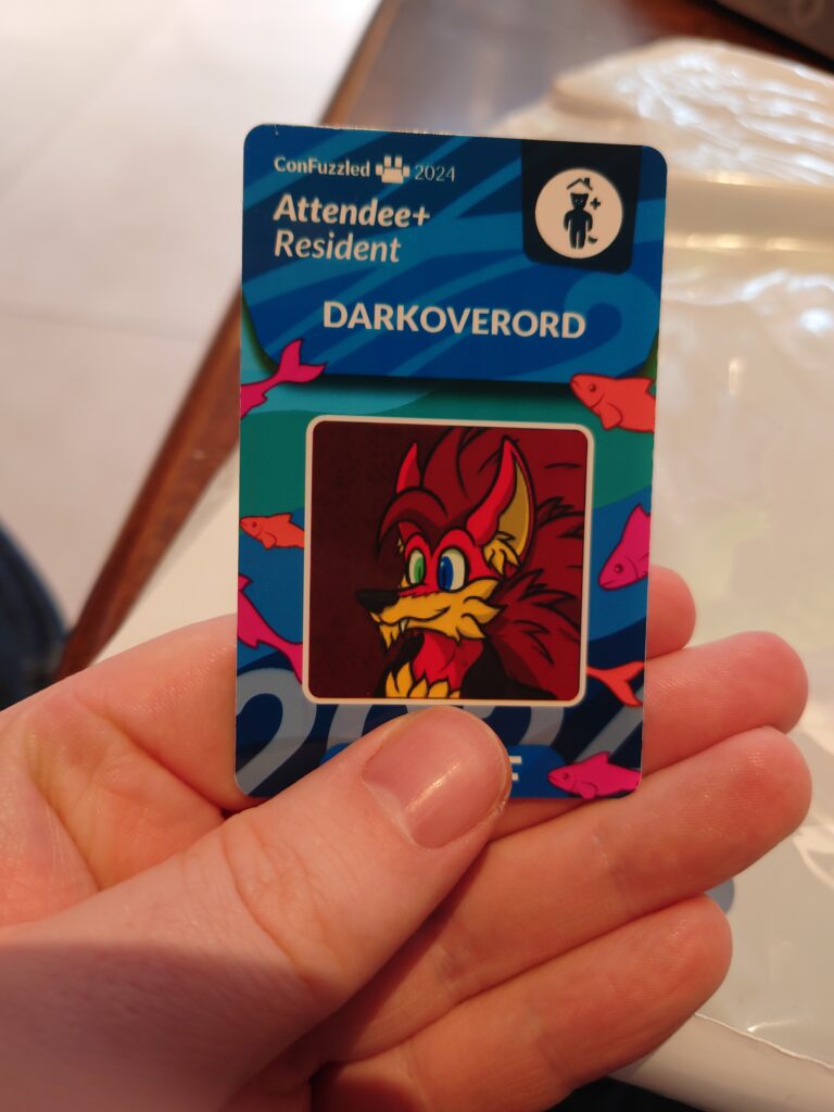 A photo of DarkOverord's Confuzzled Con ID badge