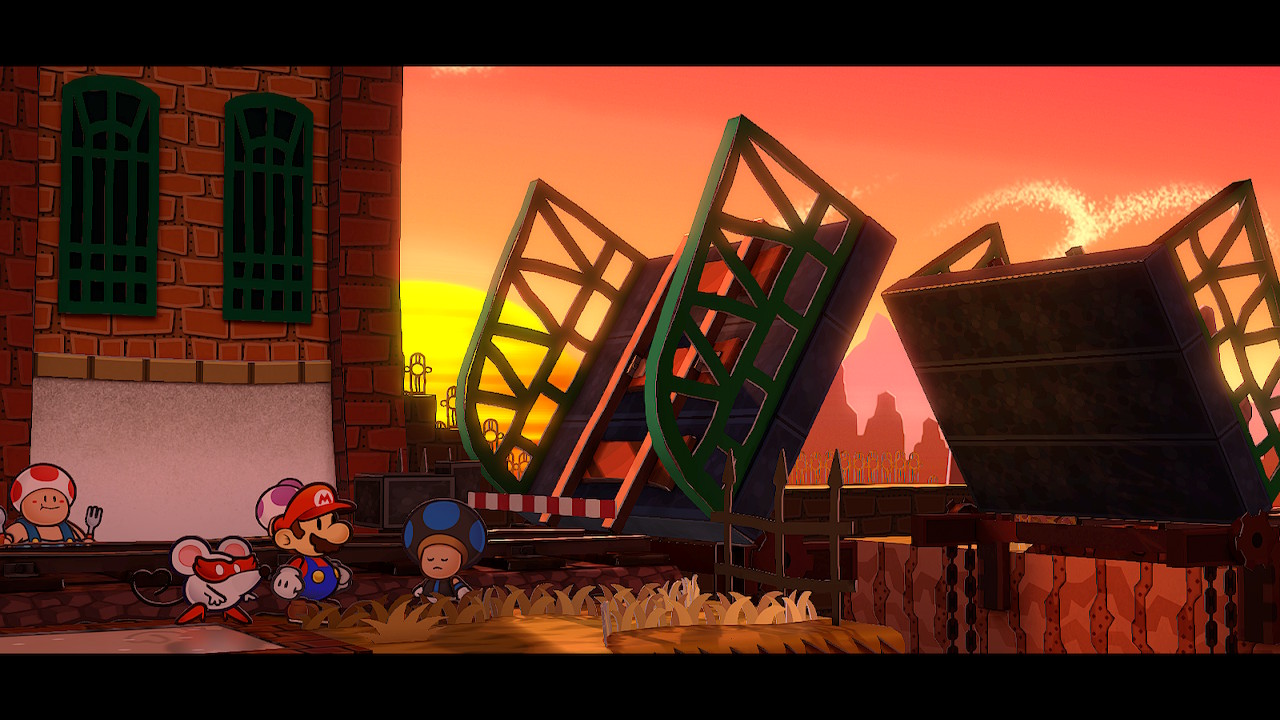 A screenshot of Paper Mario: The Thousand-Year Door Switch Remake, Mario and a Conductor Toad looking at the raised bridge at the Riverside Station