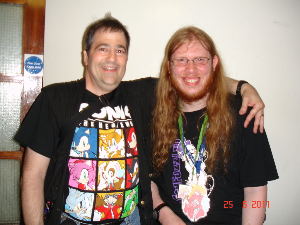 A photo of DarkOverord (Right) and Mike Pollock (Left)